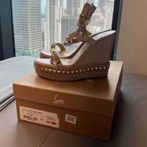 Louboutin wedges… used but can easily be restored by a cobbler.